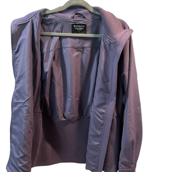 Athleta stride purple jacket. Zipper pockets, fully lined knit detail on back. - Picture 5 of 7